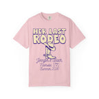 Pink t-shirt with "Her Last Rodeo" text, boot graphic, and event details.