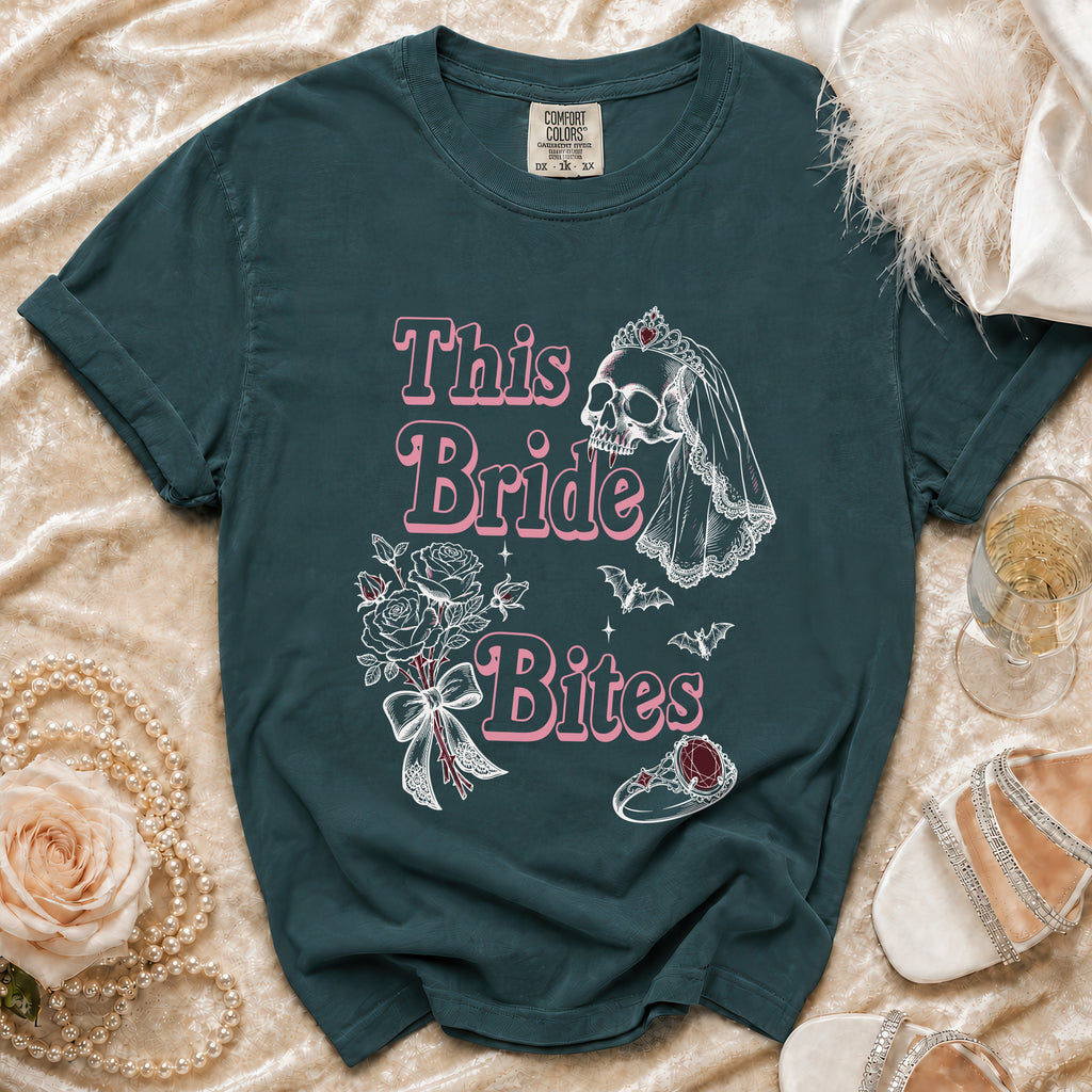 Dark teal shirt with "This Bride Bites" text and skull graphic.