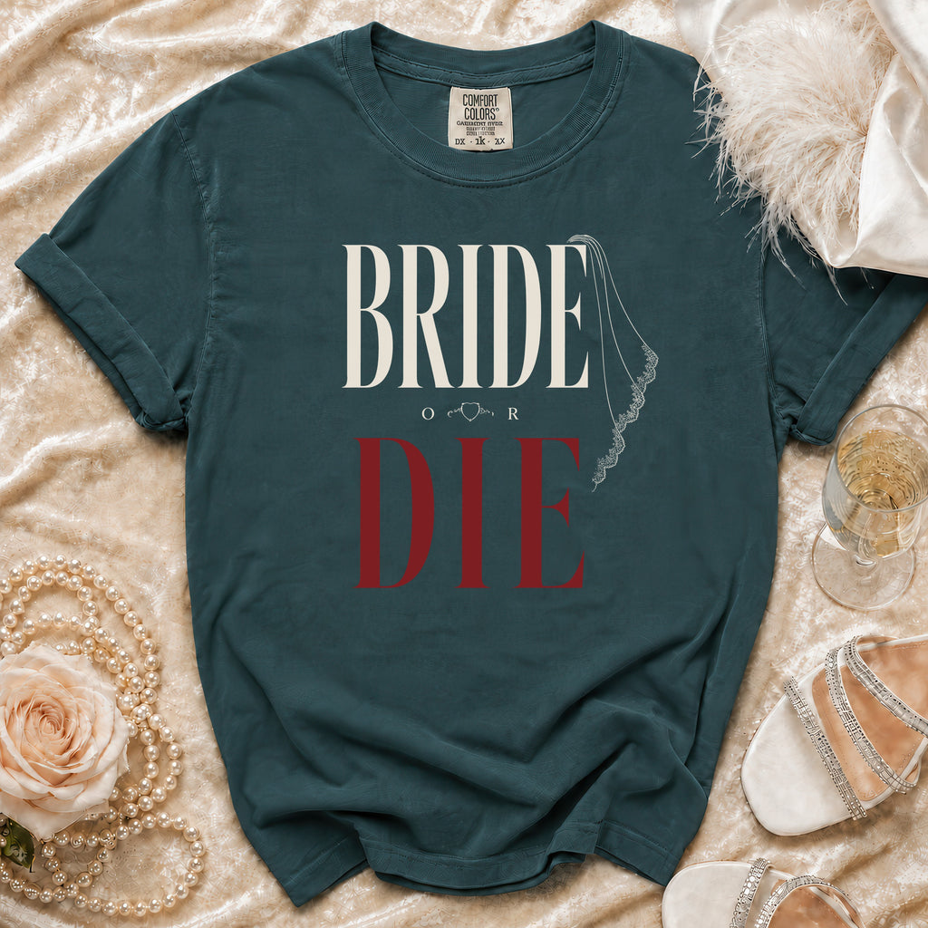 Teal t-shirt with "BRIDE OR DIE" text and bridal veil graphic.