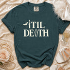 Teal t-shirt with "Til Death" text, bat, candle, and coffin graphic.