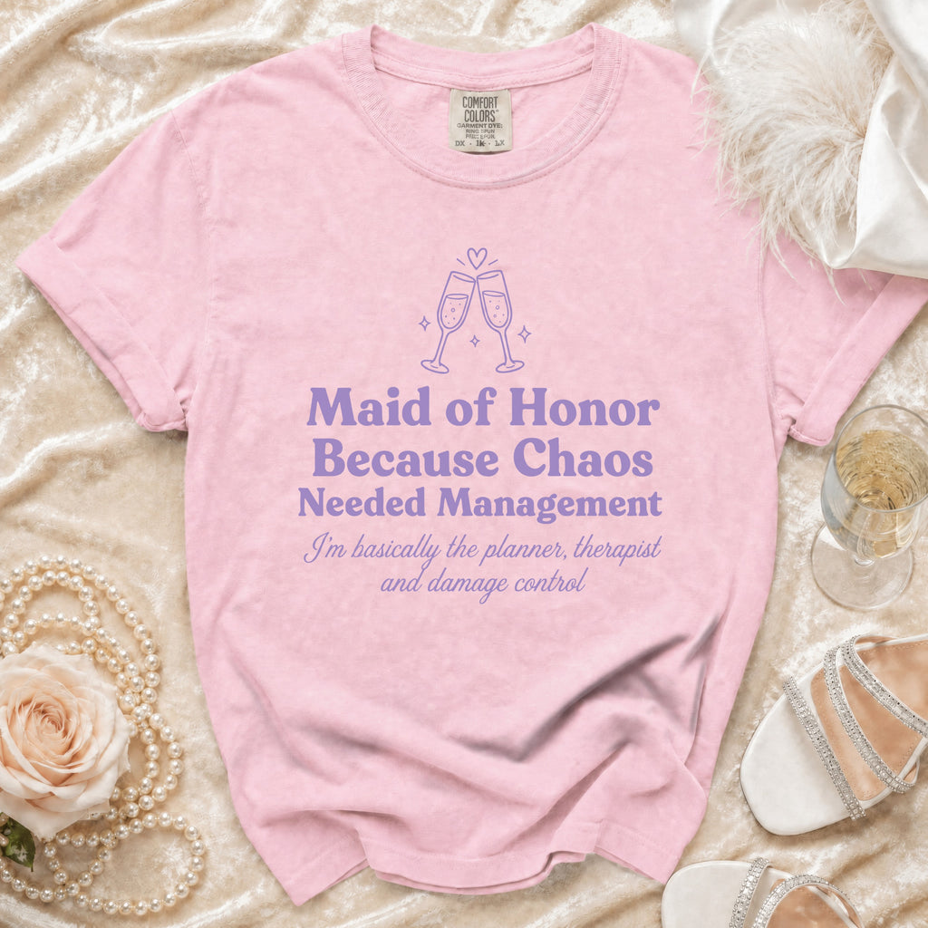 Pink t-shirt with "Maid of Honor Because Chaos Needed Management" text.