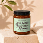 Scented candle with label "Smells Like Love Made This House a Home".