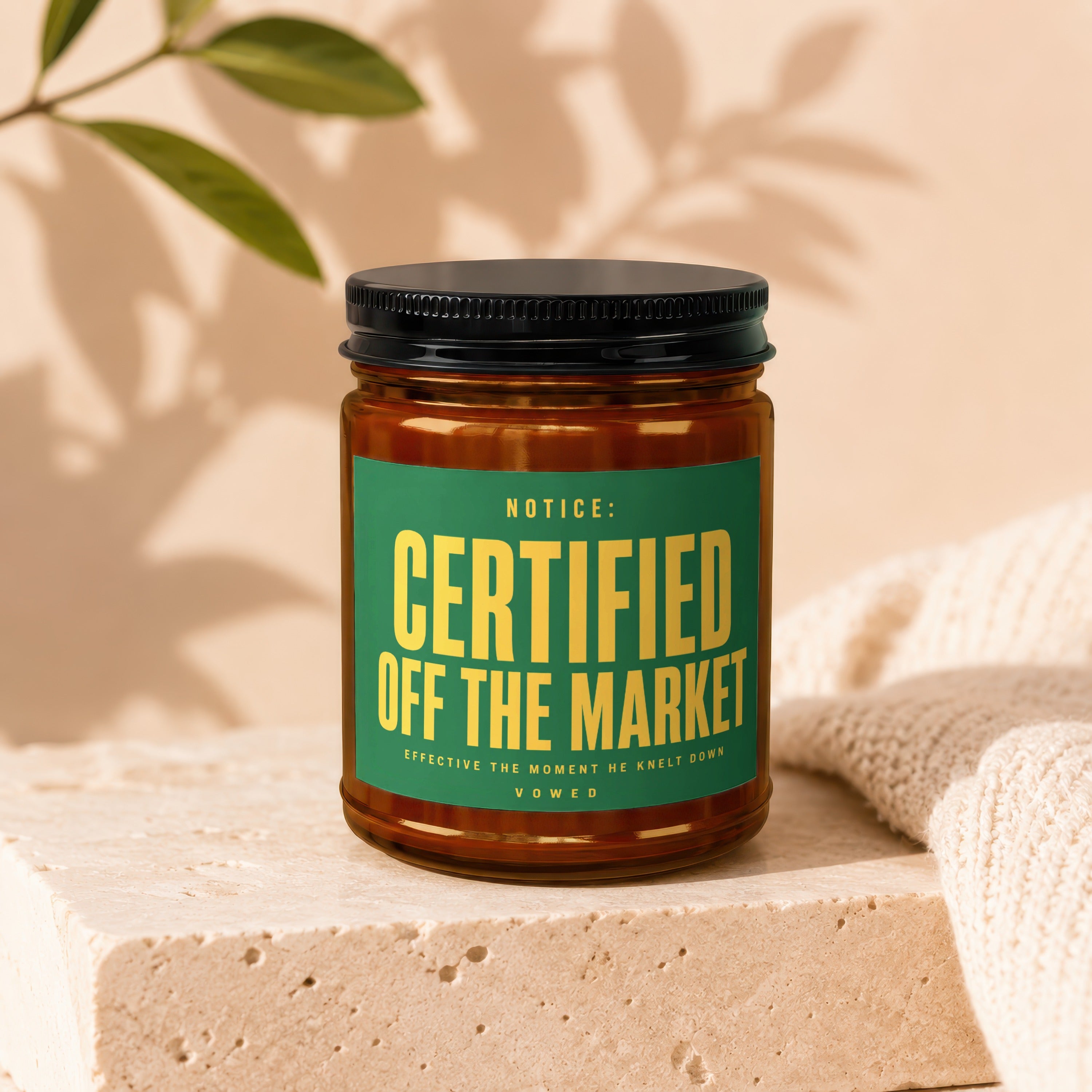 Amber jar with black lid, green label reads: Certified Off the Market.