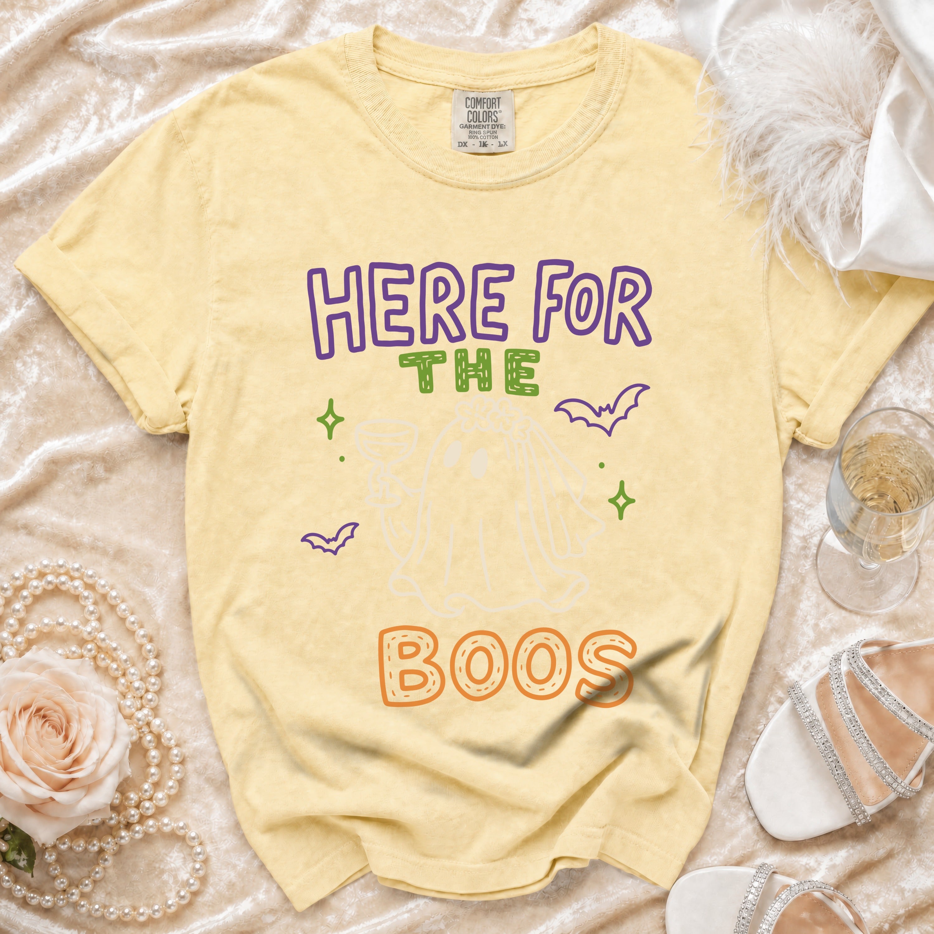 Yellow t-shirt with "HERE FOR THE BOOS" graphic featuring a ghost.