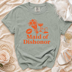 Maid of Dishonor t-shirt with orange floral and lipstick graphics.