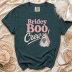 Teal t-shirt with "Briday Boo Crew" text and ghost bride graphic.
