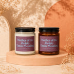 Two candles labeled "Mother of the Bride Entire Wedding" on decorative stands.