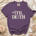 Purple t-shirt with "Til Death" phrase featuring bat, candle, and coffin graphics.