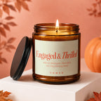 Amber candle labeled "Engaged & Thrilled" with scent notes and "VOWED."