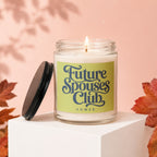 Lit candle in a glass jar with "Future Spouses Club Vowed" text on label.