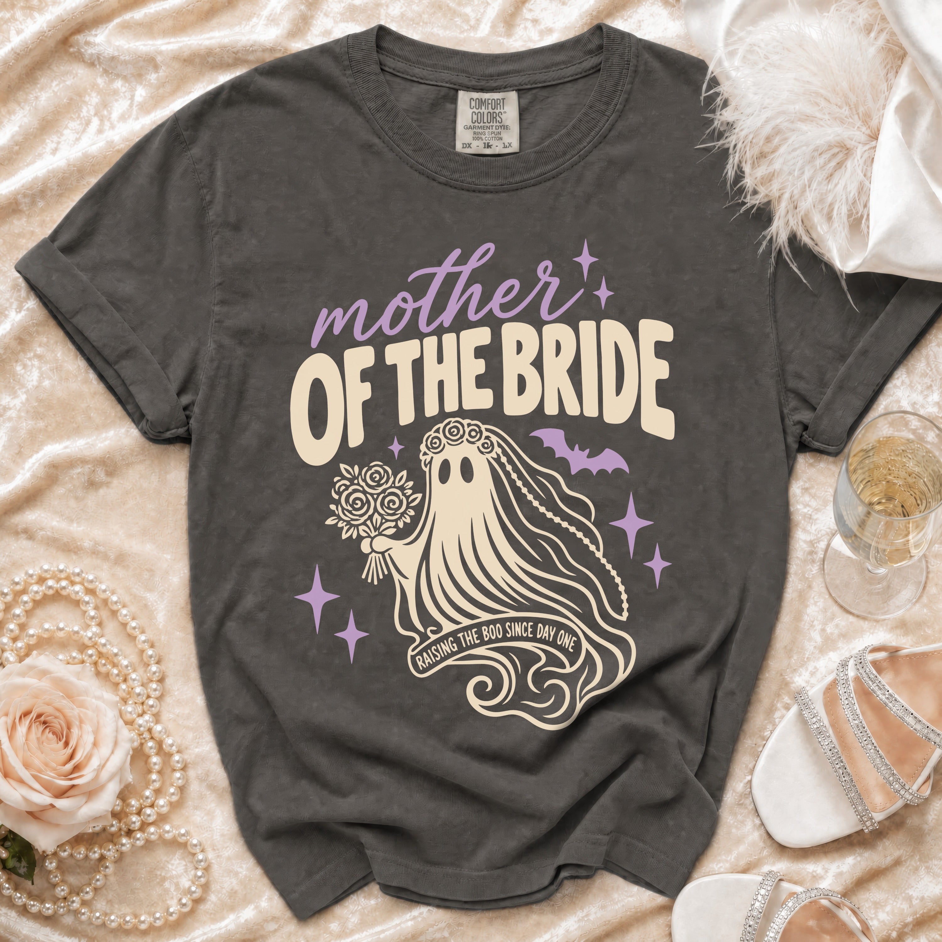 Grey t-shirt with "mother OF THE BRIDE" and ghost graphic reading "RAISING THE BOO SINCE DAY ONE".