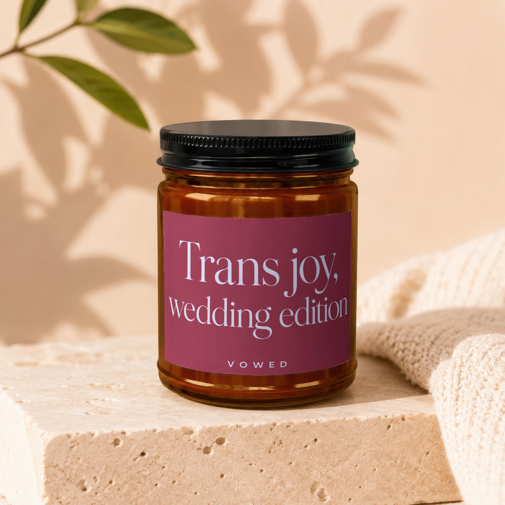 Amber jar candle labeled "Trans joy, wedding edition" by VOWED.