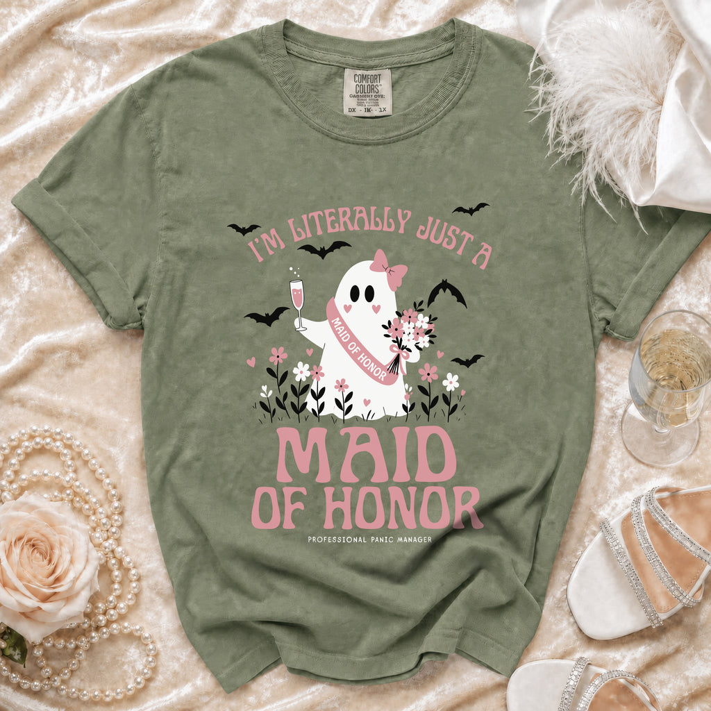 Green t-shirt with a ghost graphic that says "Maid of Honor" and "Professional Panic Manager".