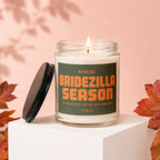 Candle with "BRIDEZILLA SEASON" text on label, lid off.