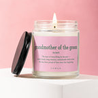 Candle with pink label reading "grandmother of the groom, noun" and definition.