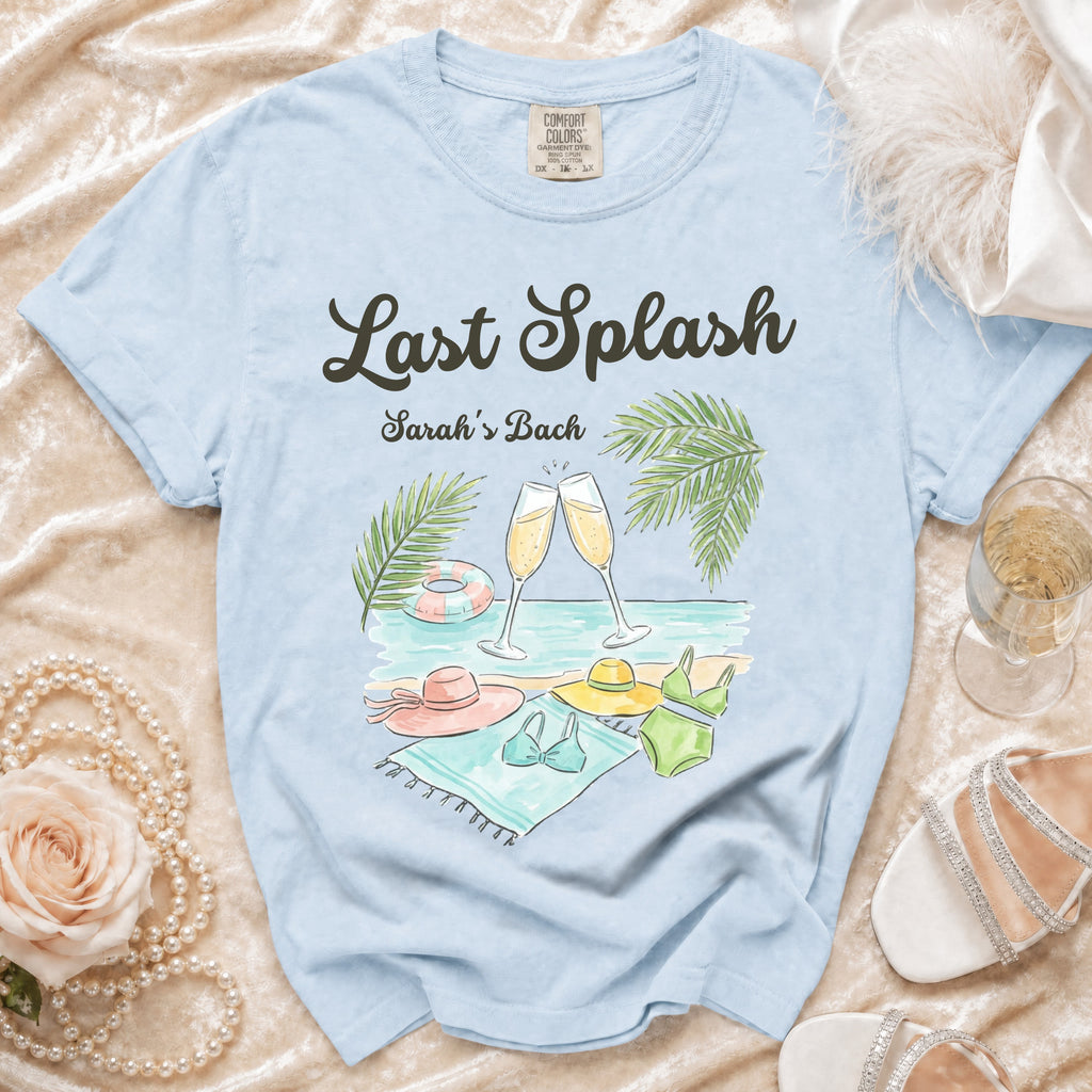 Light blue t-shirt with "Last Splash Sarah's Bach" text and beach scene.