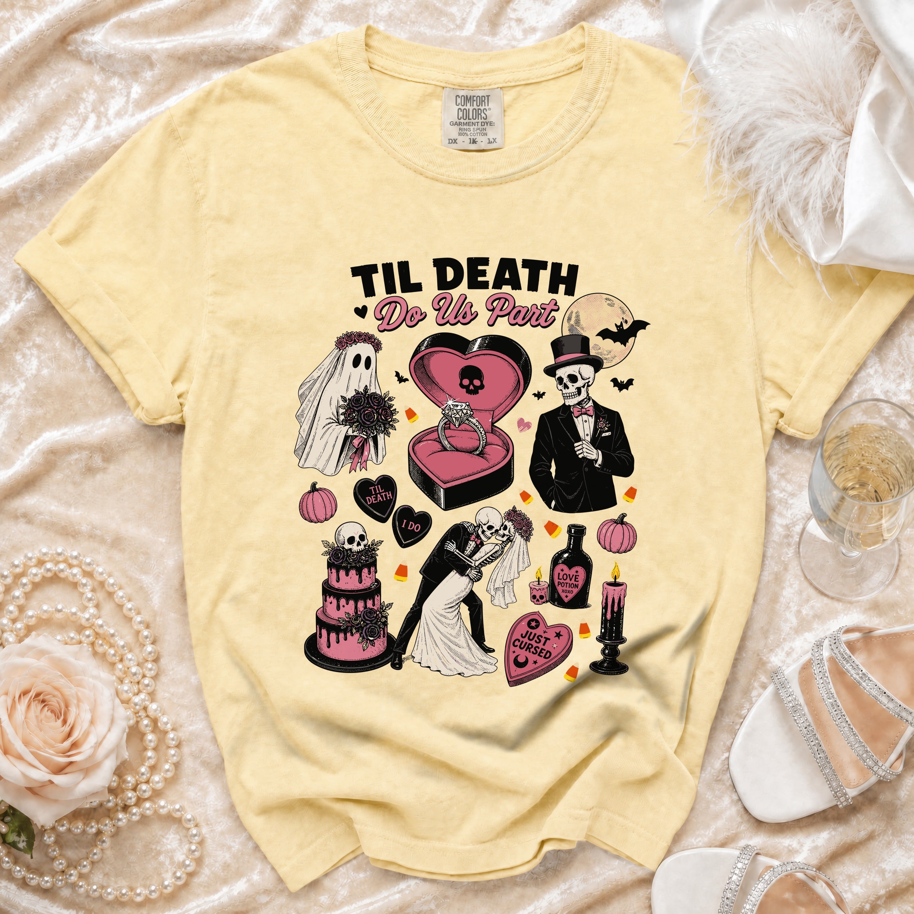 Yellow t-shirt with "Til Death Do Us Part" Halloween wedding graphic featuring skeletons.
