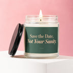 Scented candle in glass jar with black lid, reads "Save the Date, Not Your Sanity."