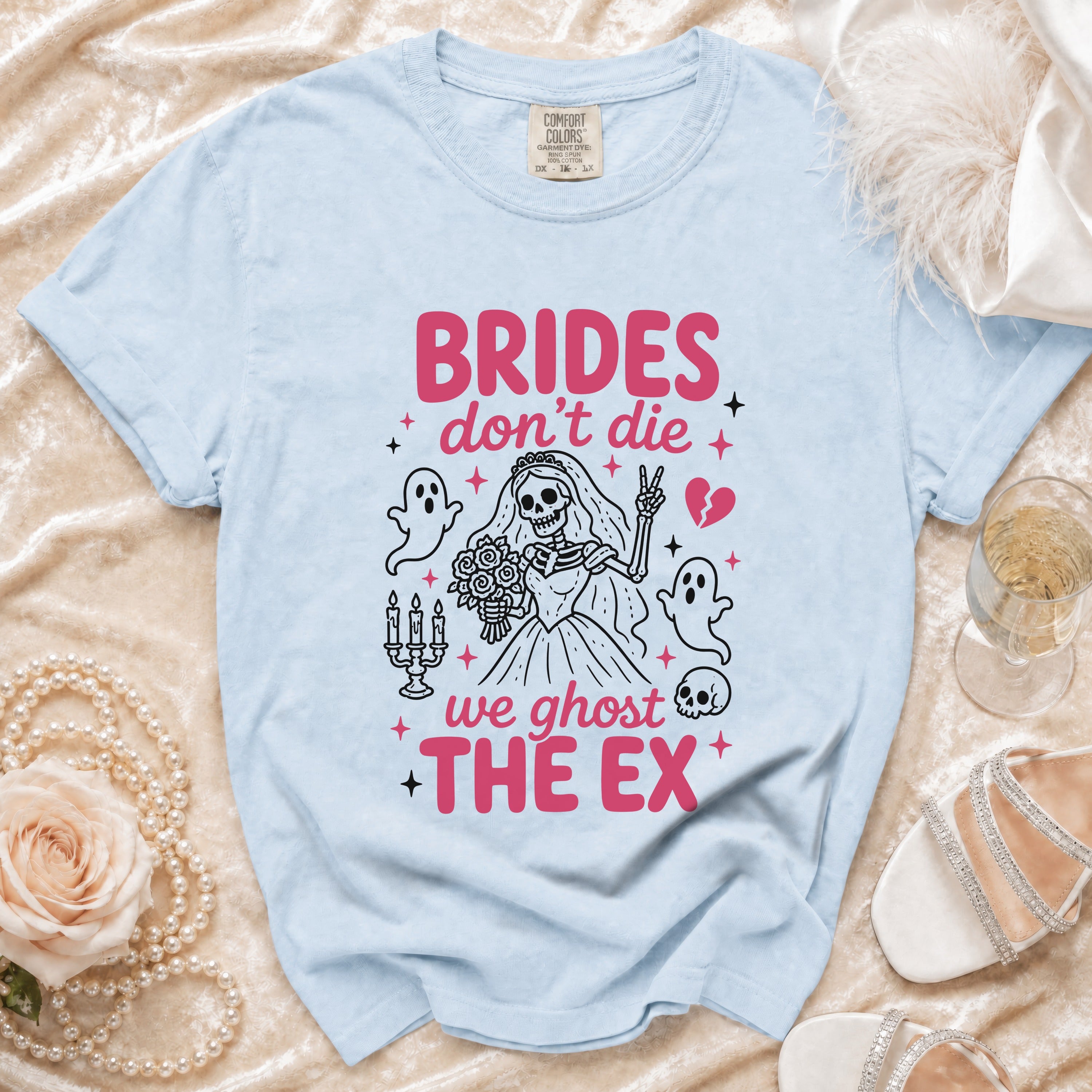 Light blue t-shirt with skeleton bride graphic and "BRIDES don't die we ghost THE EX" text.
