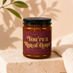 Candle labeled "You're a Man of Honor" with wedding-themed text.