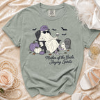 Ghost wearing "Mother of the Bride" hat, sunglasses, chair, wine, and text "Mother of the Bride, Slaying Spirits."