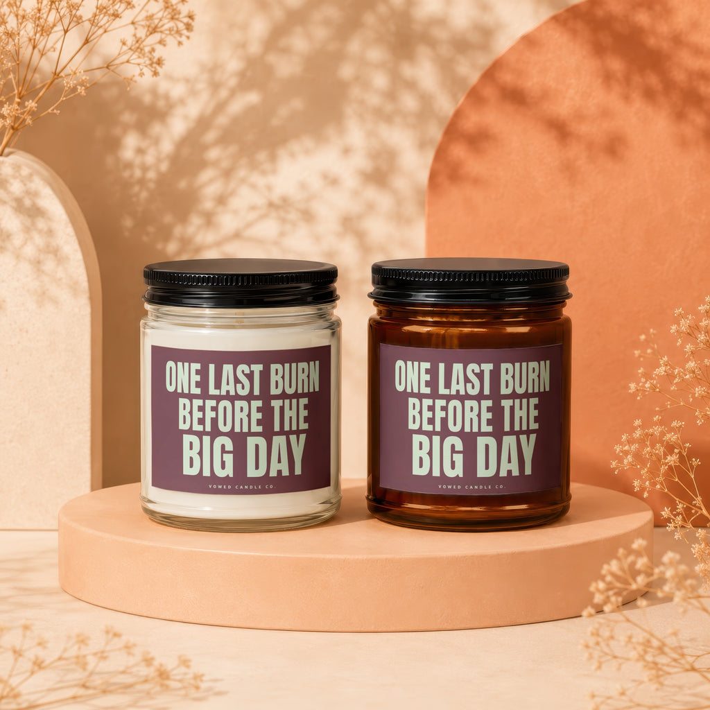 Two candles with "One Last Burn Before The Big Day" text sit on display stands.