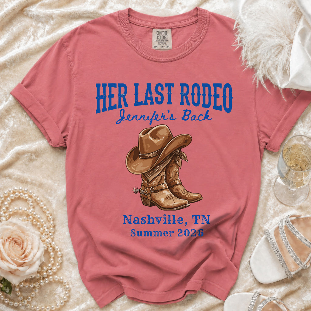 Pink t-shirt with "Her Last Rodeo" and cowboy boots graphic.