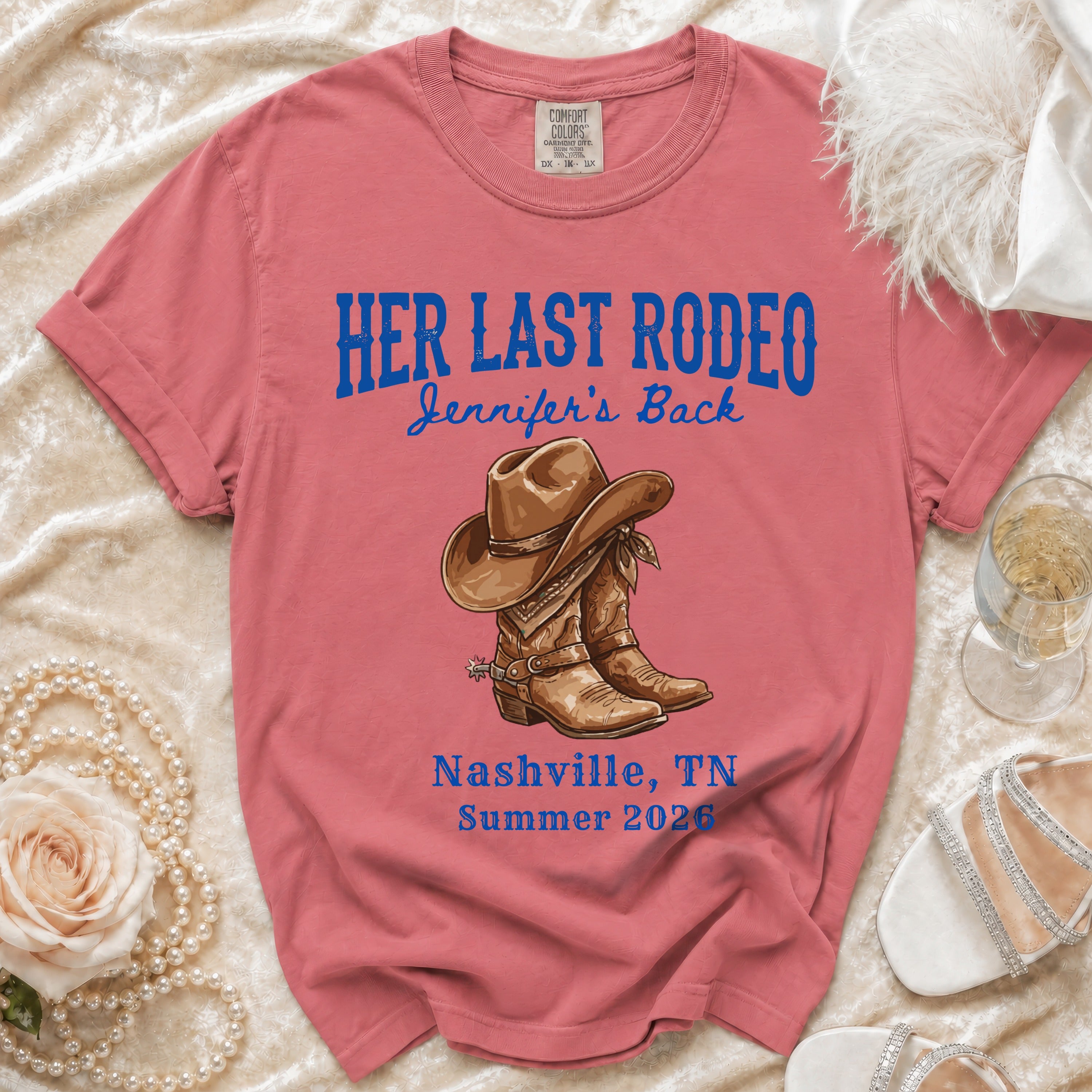 Pink t-shirt with "Her Last Rodeo" and cowboy boots graphic.