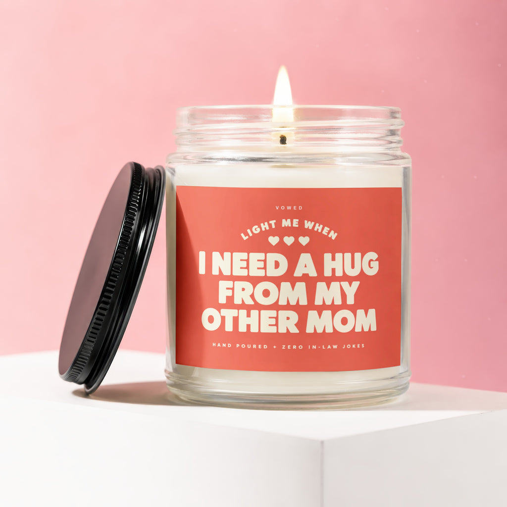 Vowed candle reads "Light me when I need a hug from my other mom."