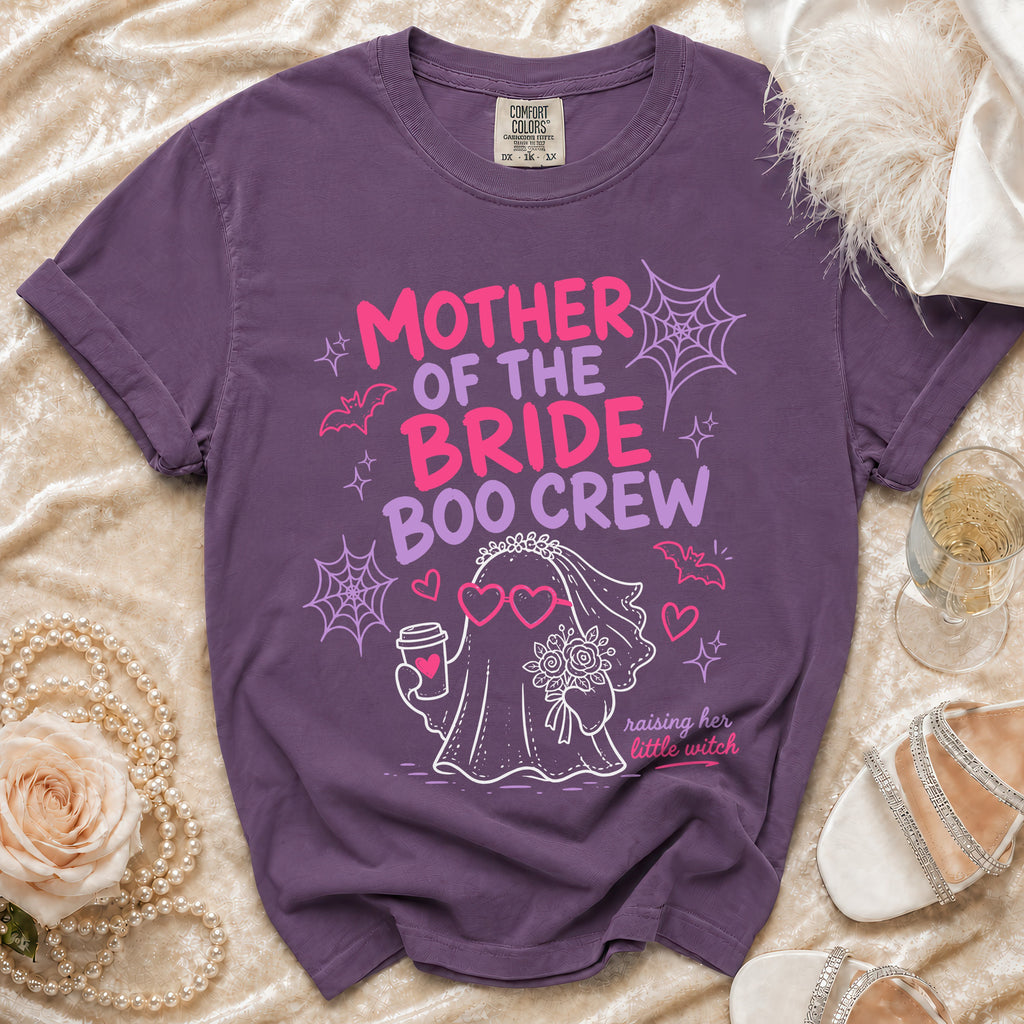 Purple t-shirt with "Mother of the Bride Boo Crew" graphic and ghost bride illustration.