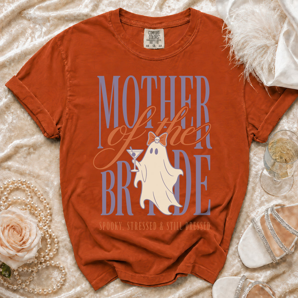 Orange t-shirt with "Mother of the Bride Spooky, Stressed & Still Dressed" text.