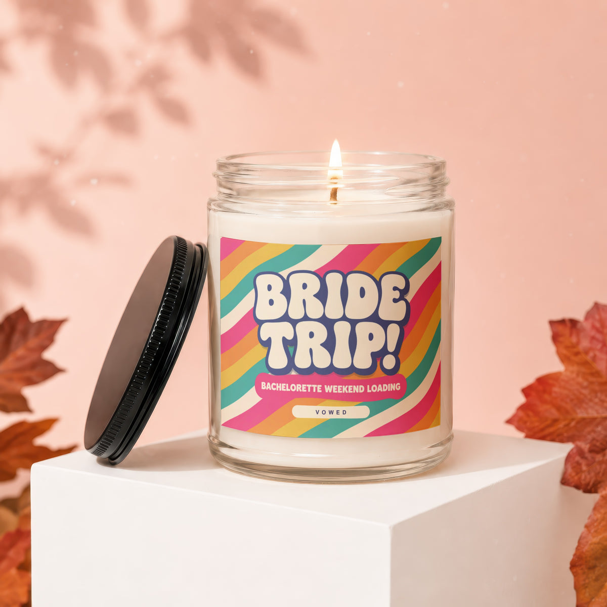 Glass candle with "BRIDE TRIP!" and "BACHELORETTE WEEKEND LOADING" text.