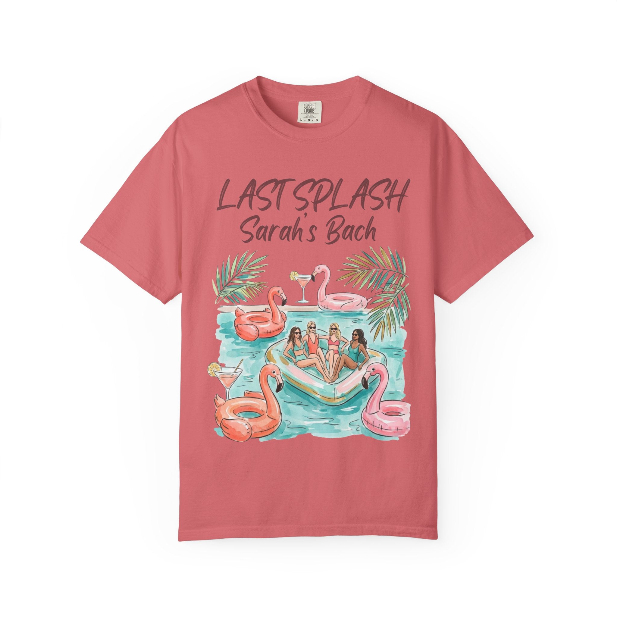 Coral t-shirt with "Last Splash Sarah's Bach" graphic of people on inflatable flamingos.