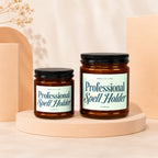 Two amber jars with black lids, labeled "Professional Spell Holder."
