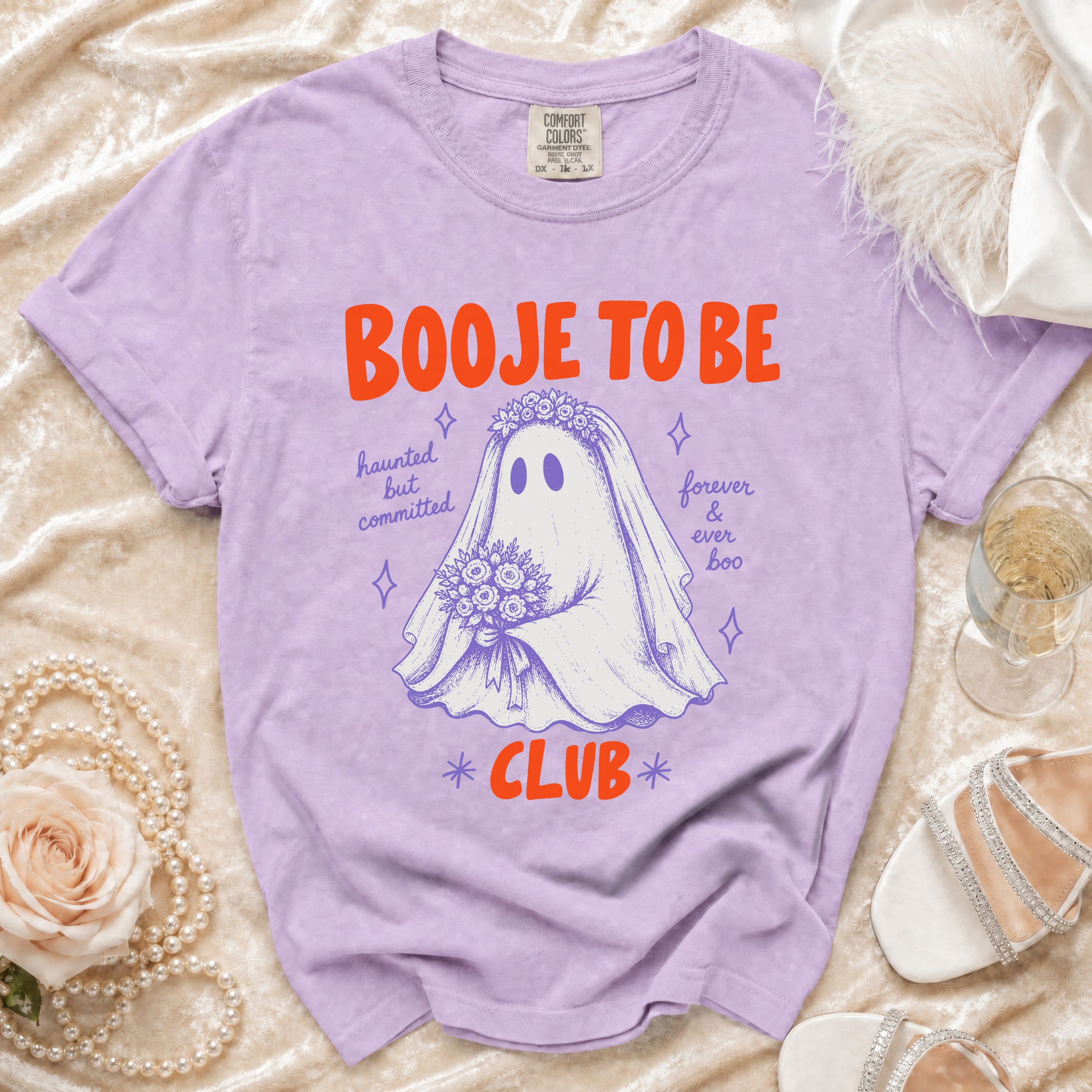 Purple t-shirt with "Booje To Be Club" graphic of a ghost bride.