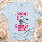 Light blue t-shirt with "Spooked & Booked Club" graphic and a ghost bride design.