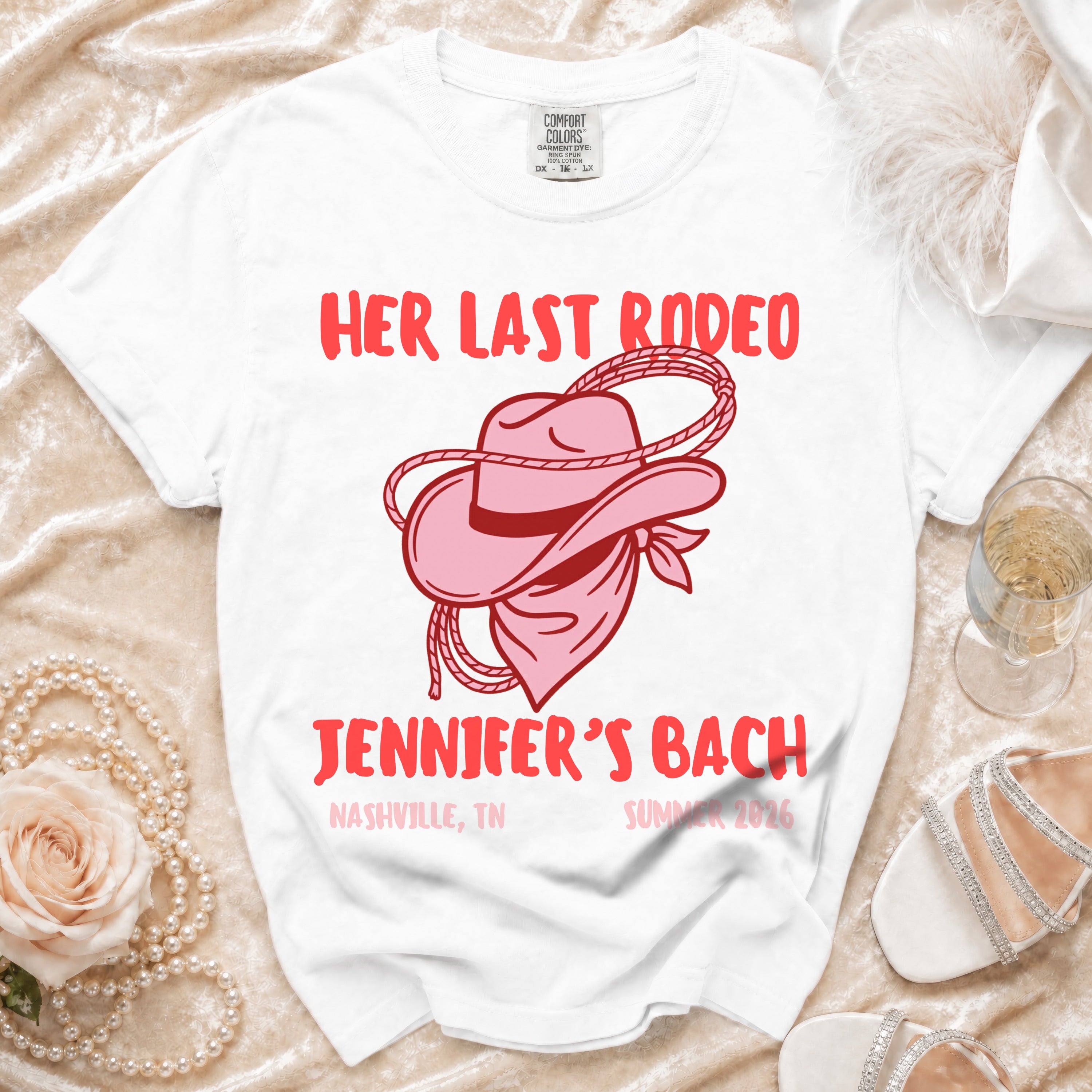 White t-shirt with "Her Last Rodeo Jennifer's Bach Nashville, TN Summer 2026" text and graphic.