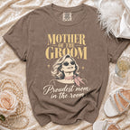 Brown t-shirt with "Mother of the Groom" and "Proudest mom in the room" text.