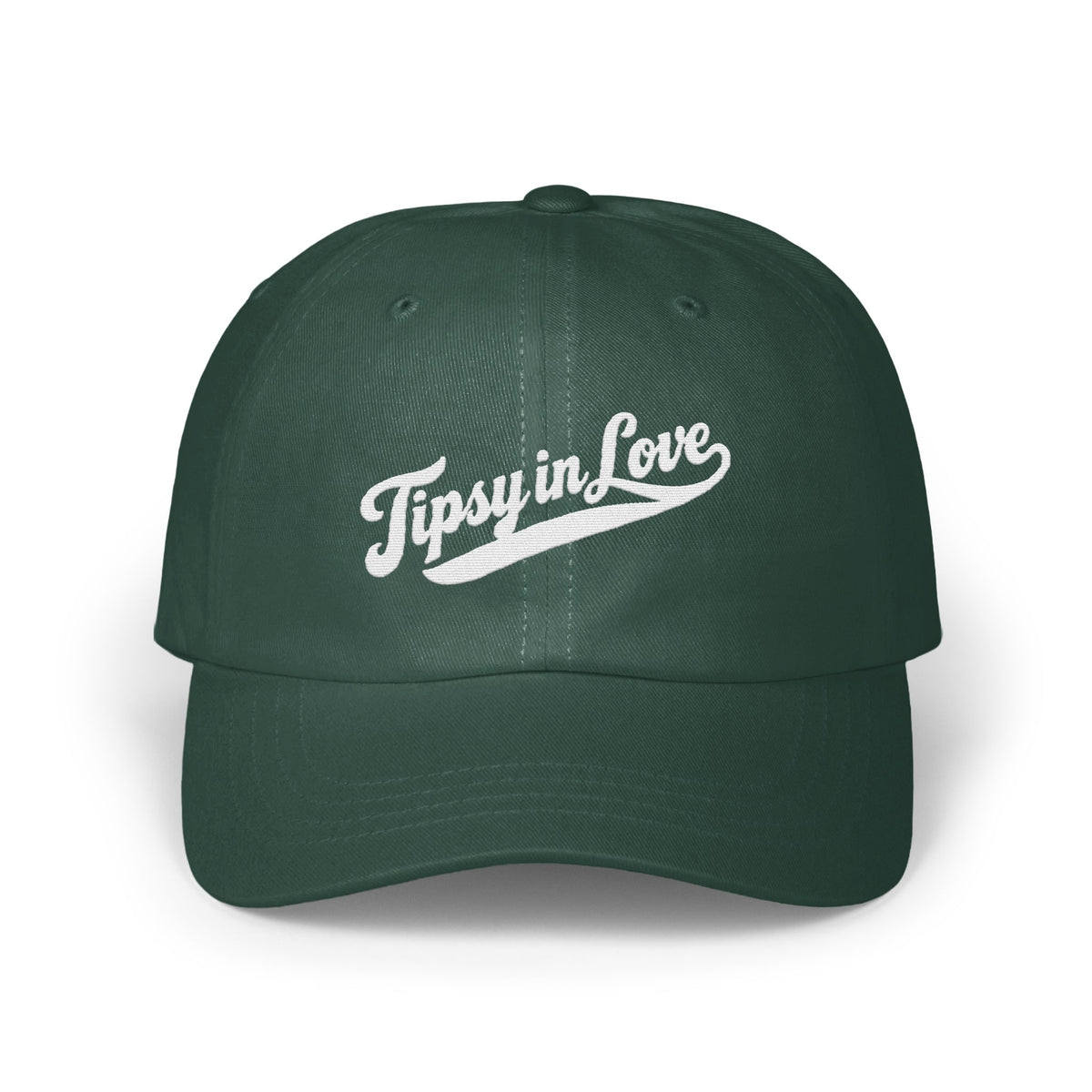A dark green baseball cap featuring white embroidered text that reads Tipsy in Love across the front.
