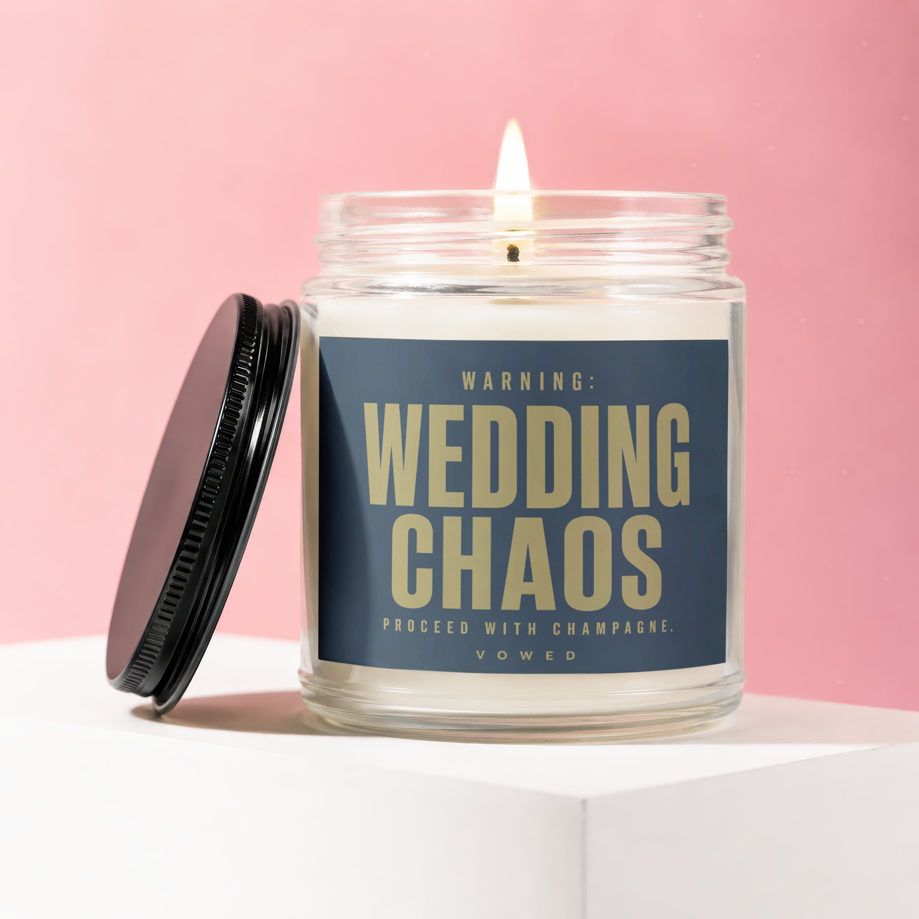Jar candle with text "Wedding Chaos Proceed with Champagne. Vowed."