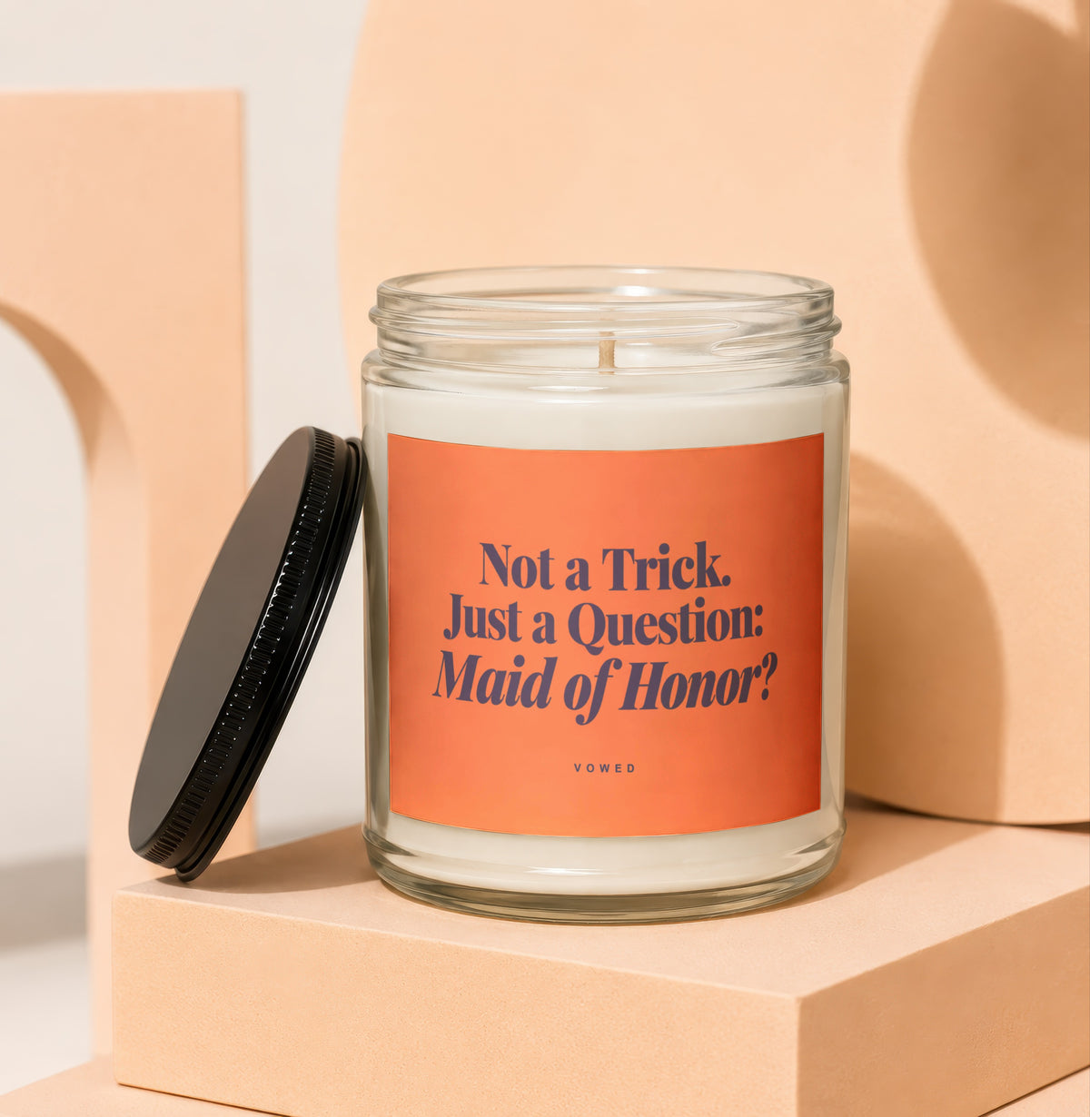 Glass candle with "Not a Trick. Just a Question: Maid of Honor?" text.