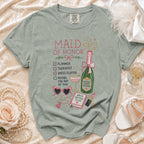 Maid of Honor t-shirt with checklist, champagne bottle, and bride survival guide.