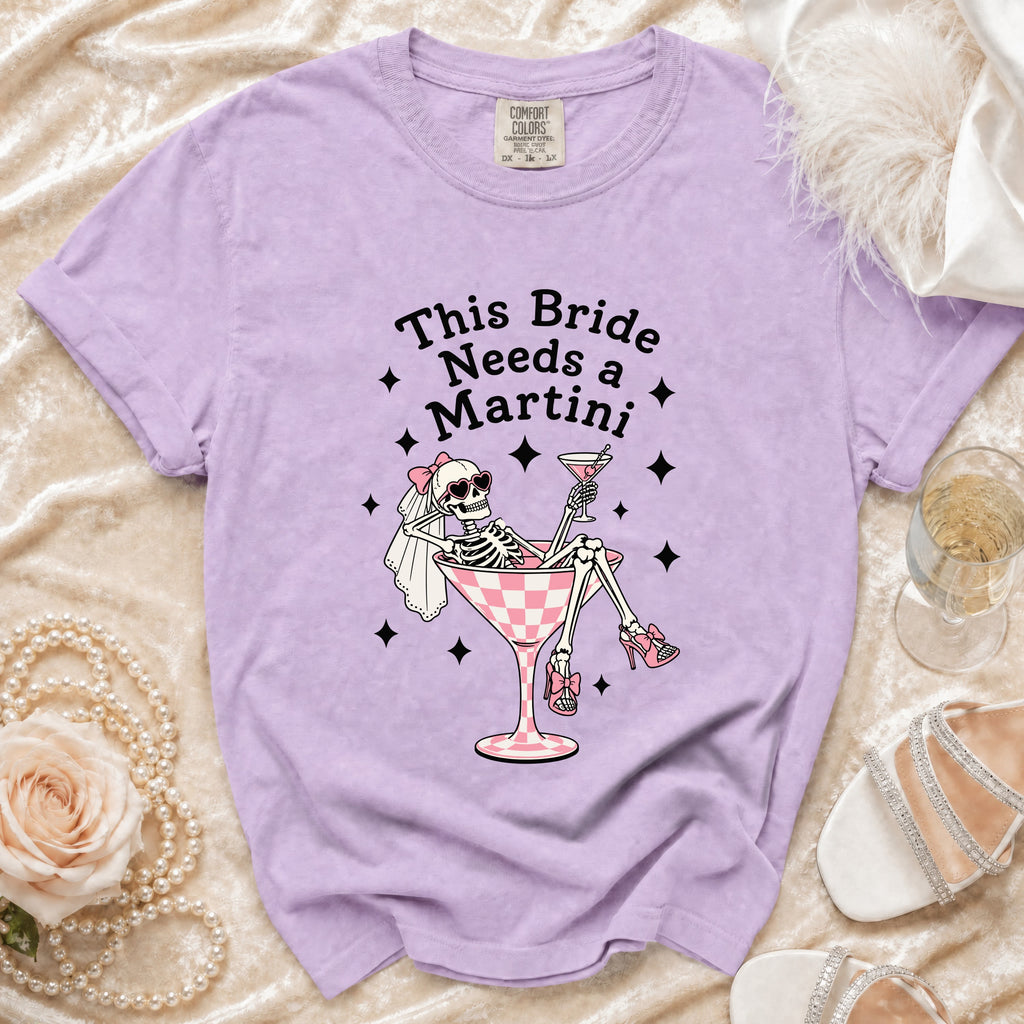 T-shirt with skeleton bride graphic and text "This Bride Needs a Martini".