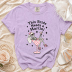 T-shirt with skeleton bride graphic and text "This Bride Needs a Martini".