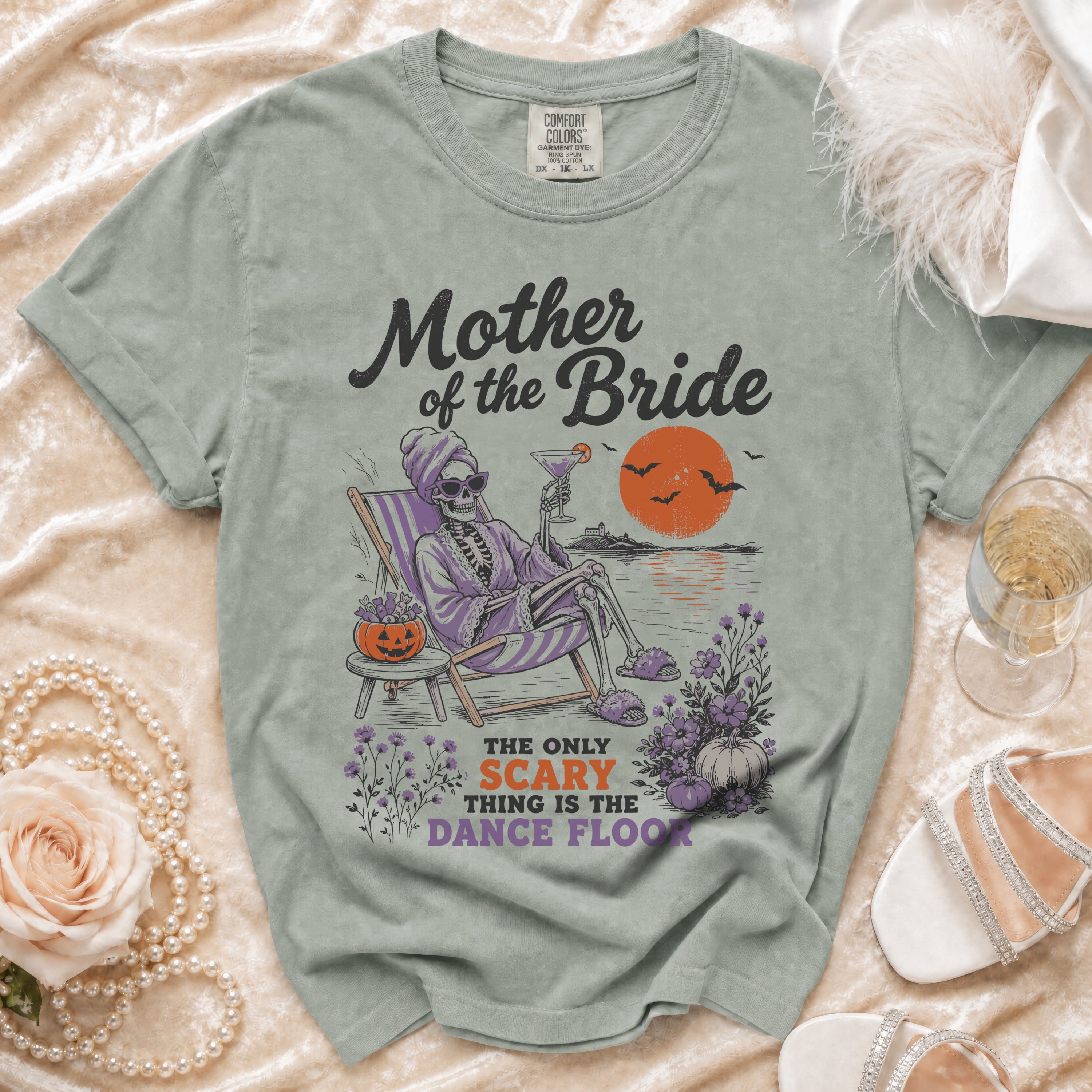 Skeleton mother of the bride relaxing with cocktail, text says "The only scary thing is the dance floor".