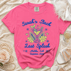 Pink t-shirt with "Sarah's Bach Last Splash Malibu, CA Summer 2026" text and cocktail graphics.