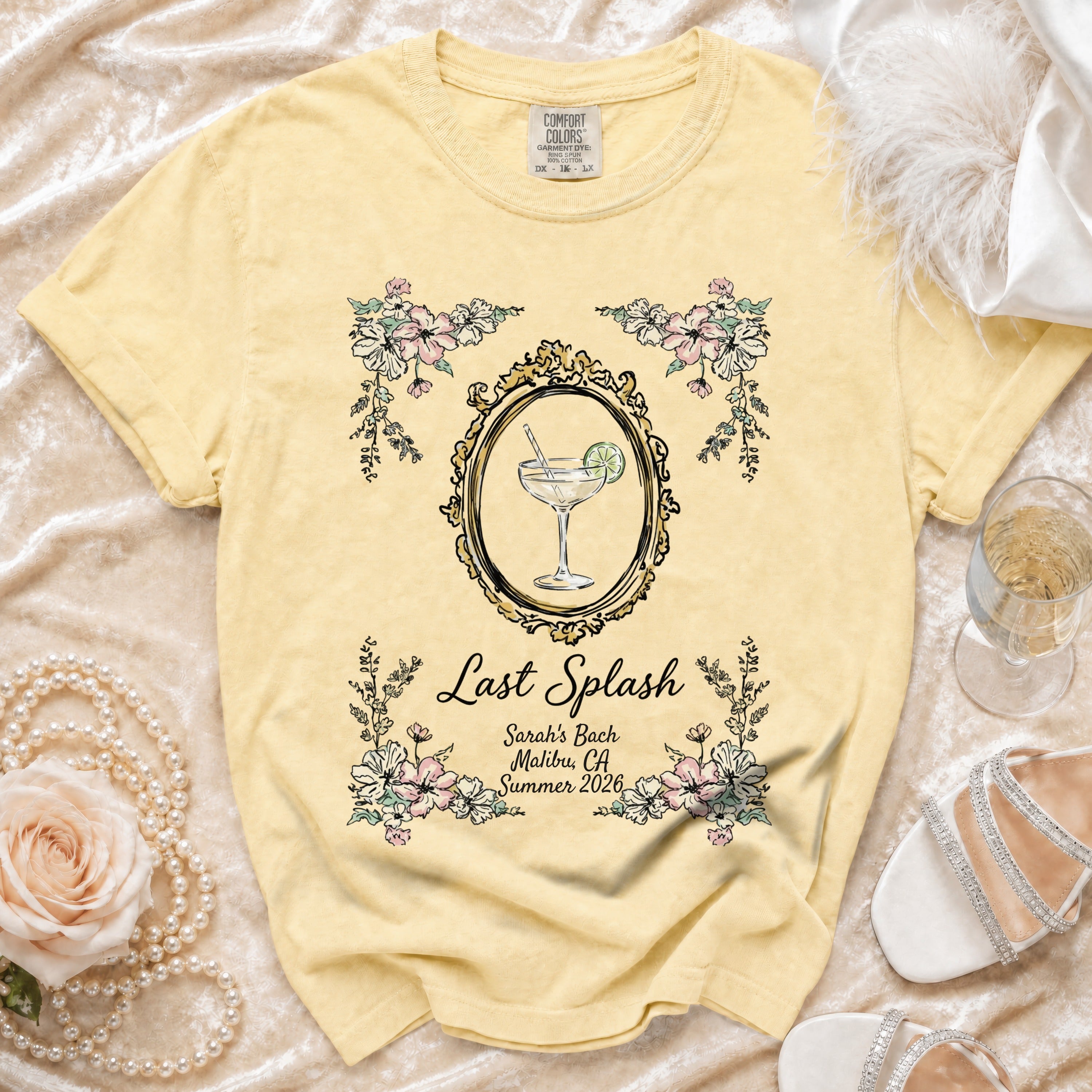 Yellow t-shirt with "Last Splash Sarah's Bach Malibu, CA Summer 2026" text and floral frame.