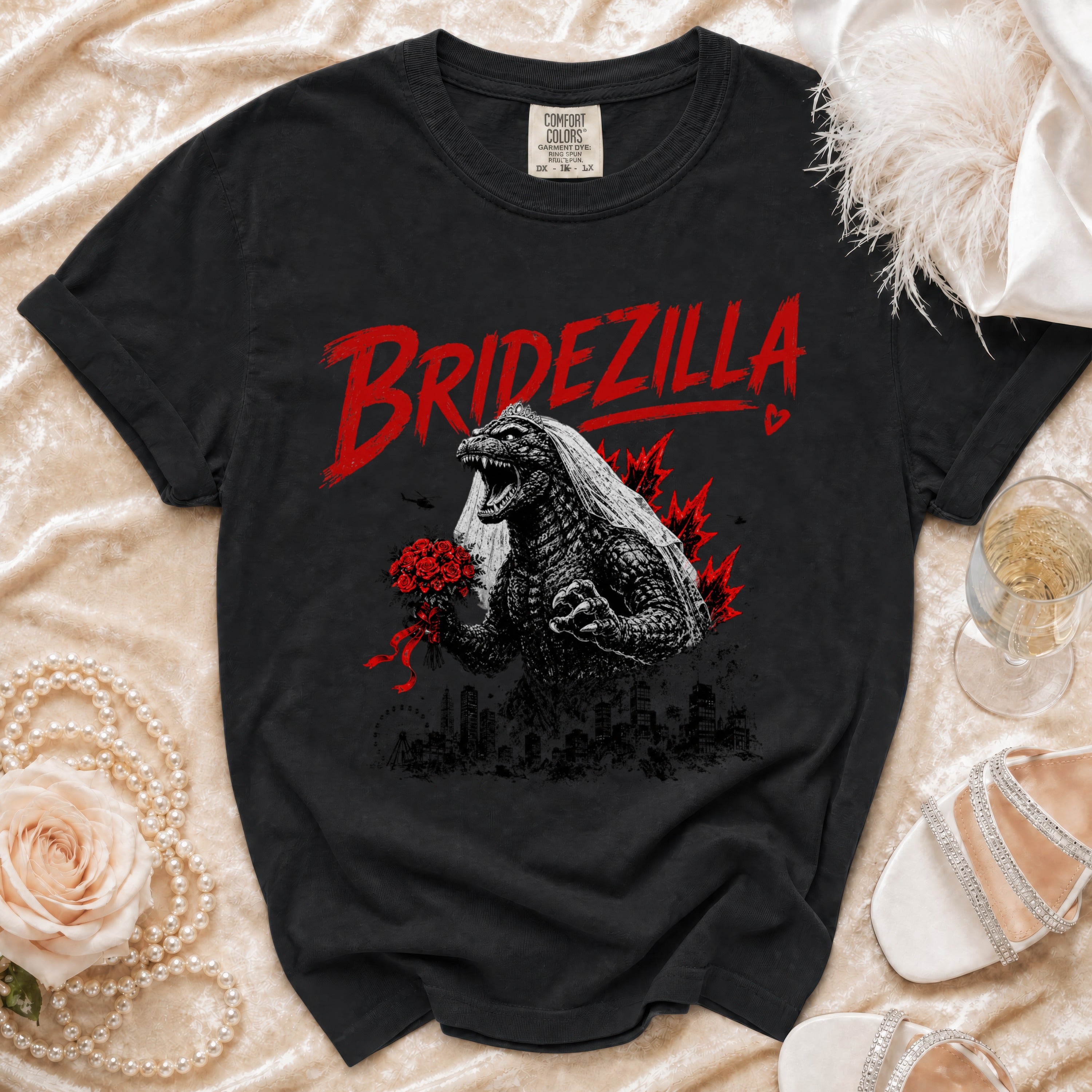 Black t-shirt with "Bridezilla" text and Godzilla wearing a bridal veil and holding flowers.