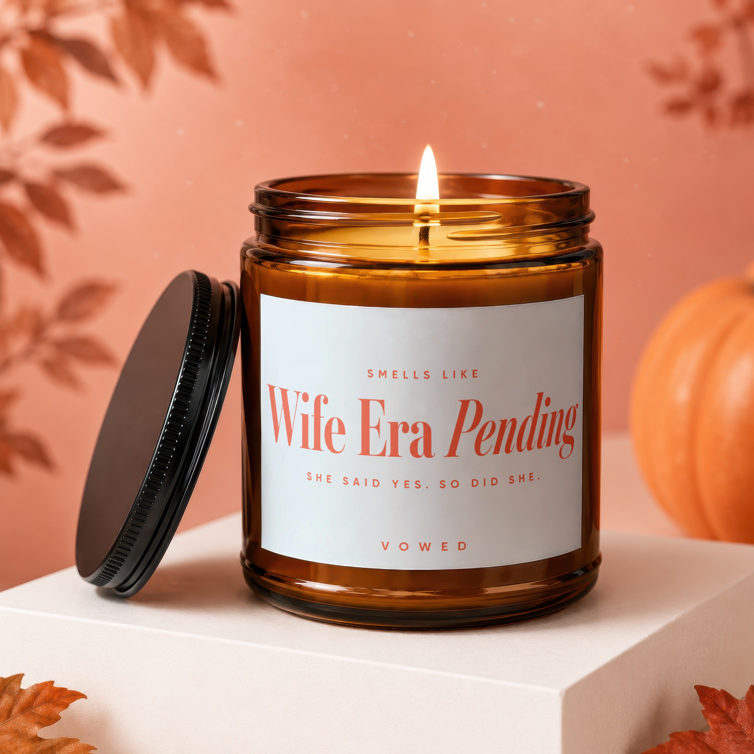Candle with "Wife Era Pending" and "She Said Yes. So Did She." text.