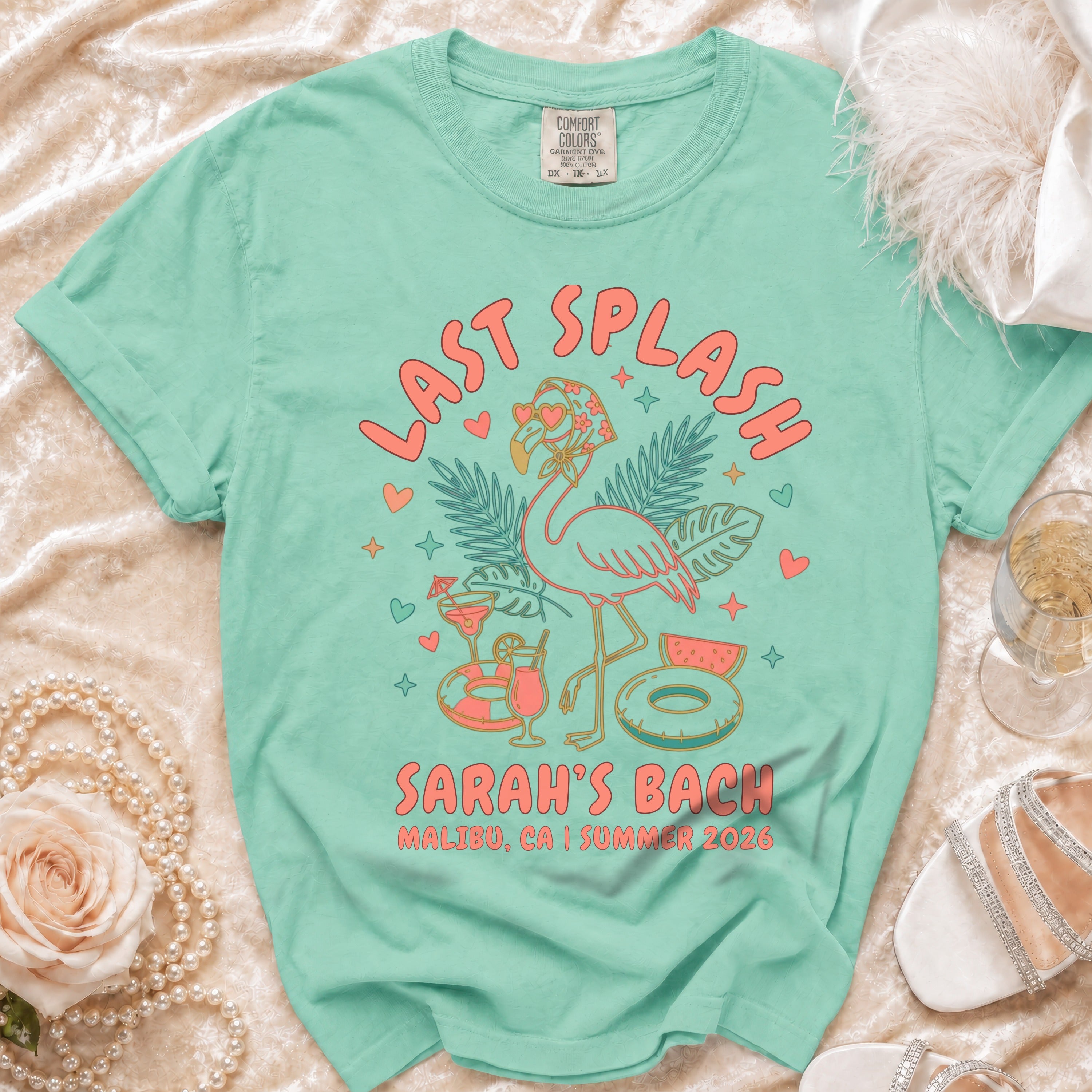 "Last Splash" Sarah's Bach tee with flamingo, hearts, and tropical graphics.